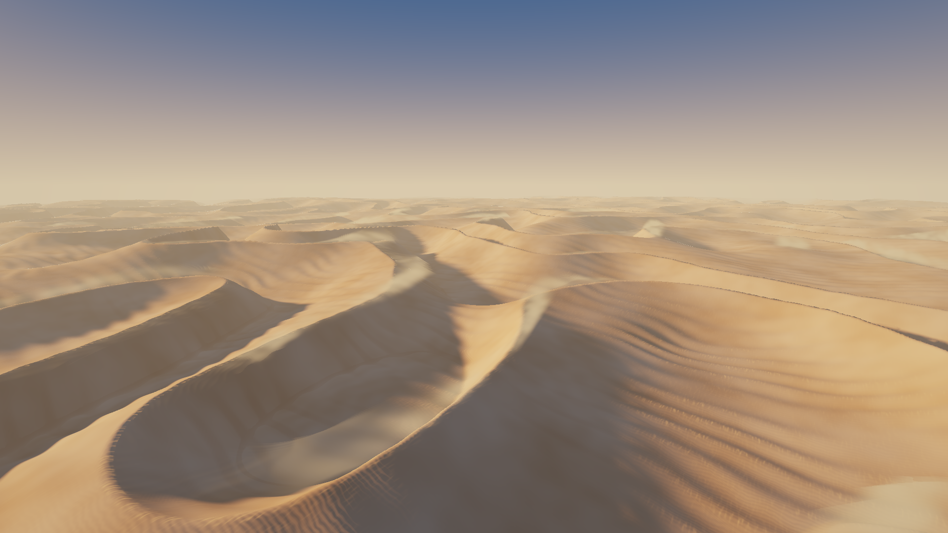 An aerial view of golden dune ridges and fine sand ripples fading into a hazy horizon